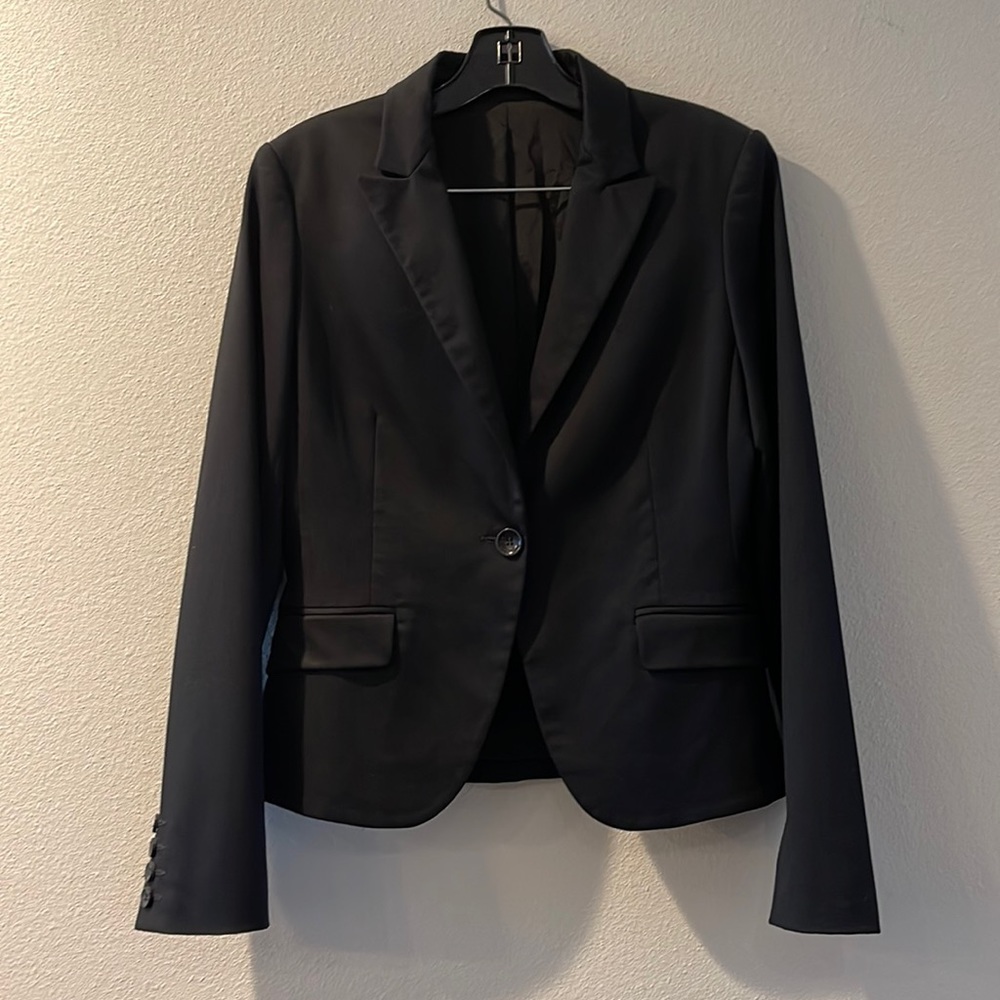 Express jacket size 6, express pants size 4.  Black pant suit.